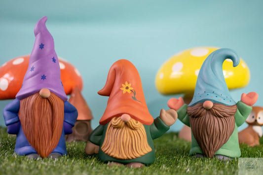 trio of whimsical fantastical wizard gnomes